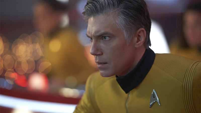 Pretty sure that, at least in this picture, the glow in the background is just from Enterprise’s retro console buttons and not the sparks of an explosion.